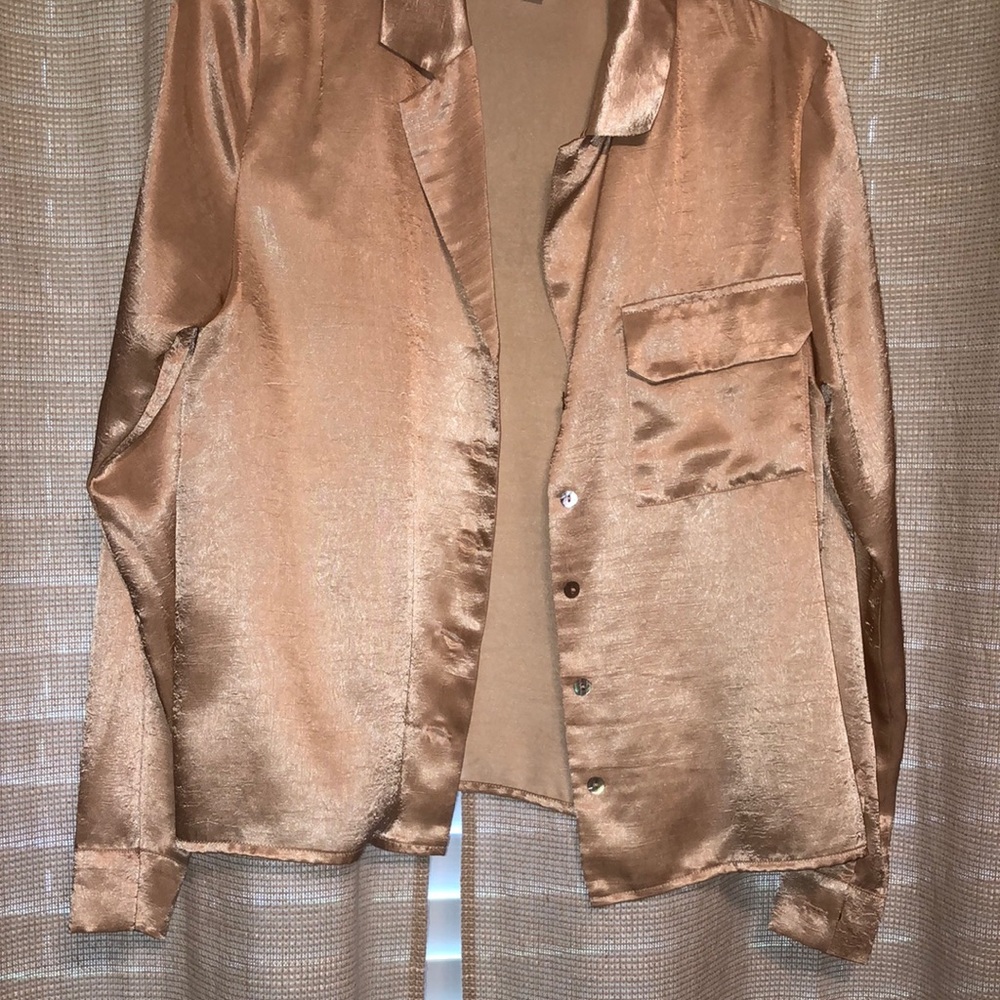 Cream colored shimmery blouse